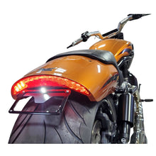 Harley V-Rod Muscle with under-fender license plate bracket installed, bright white LED, minimalist and custom design."
