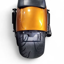 Harley V-Rod Muscle with under-fender license plate bracket installed, bright white LED, minimalist and custom design."