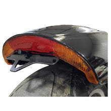 Harley V-Rod Muscle with under-fender license plate bracket installed, bright white LED, minimalist and custom design